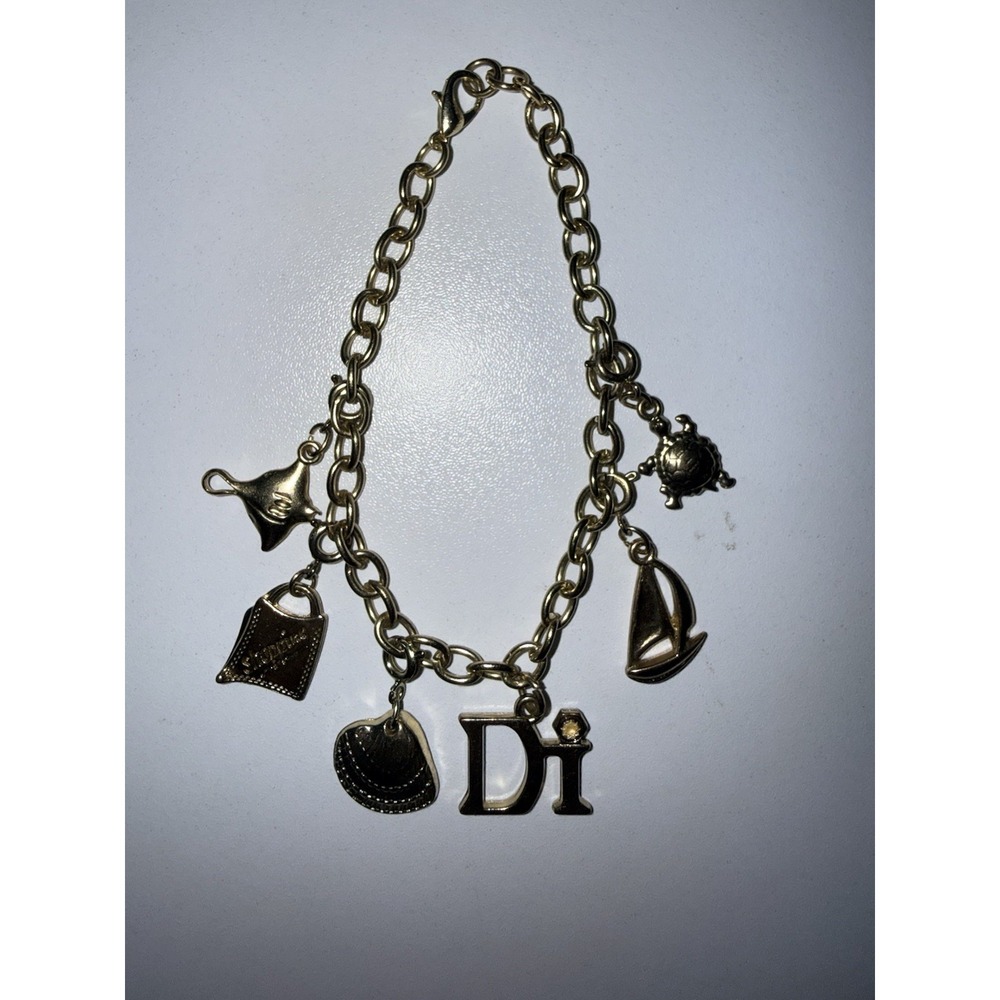 DI Diamond International Charm Bracelet 6 Charms Gold Tone Shopping Turtle Boat